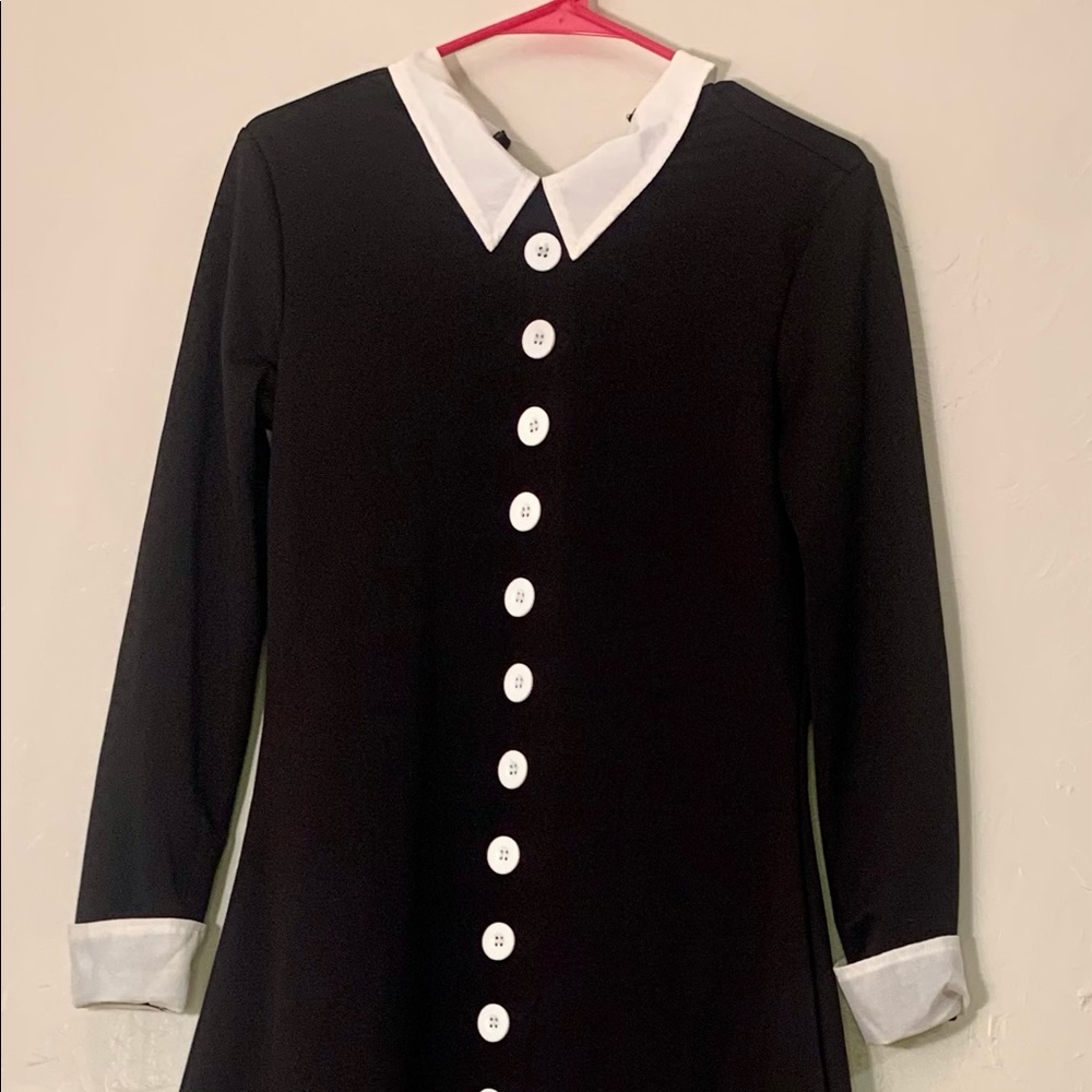 Wednesday Addams Costume. Black with white buttons, cuffs and collar